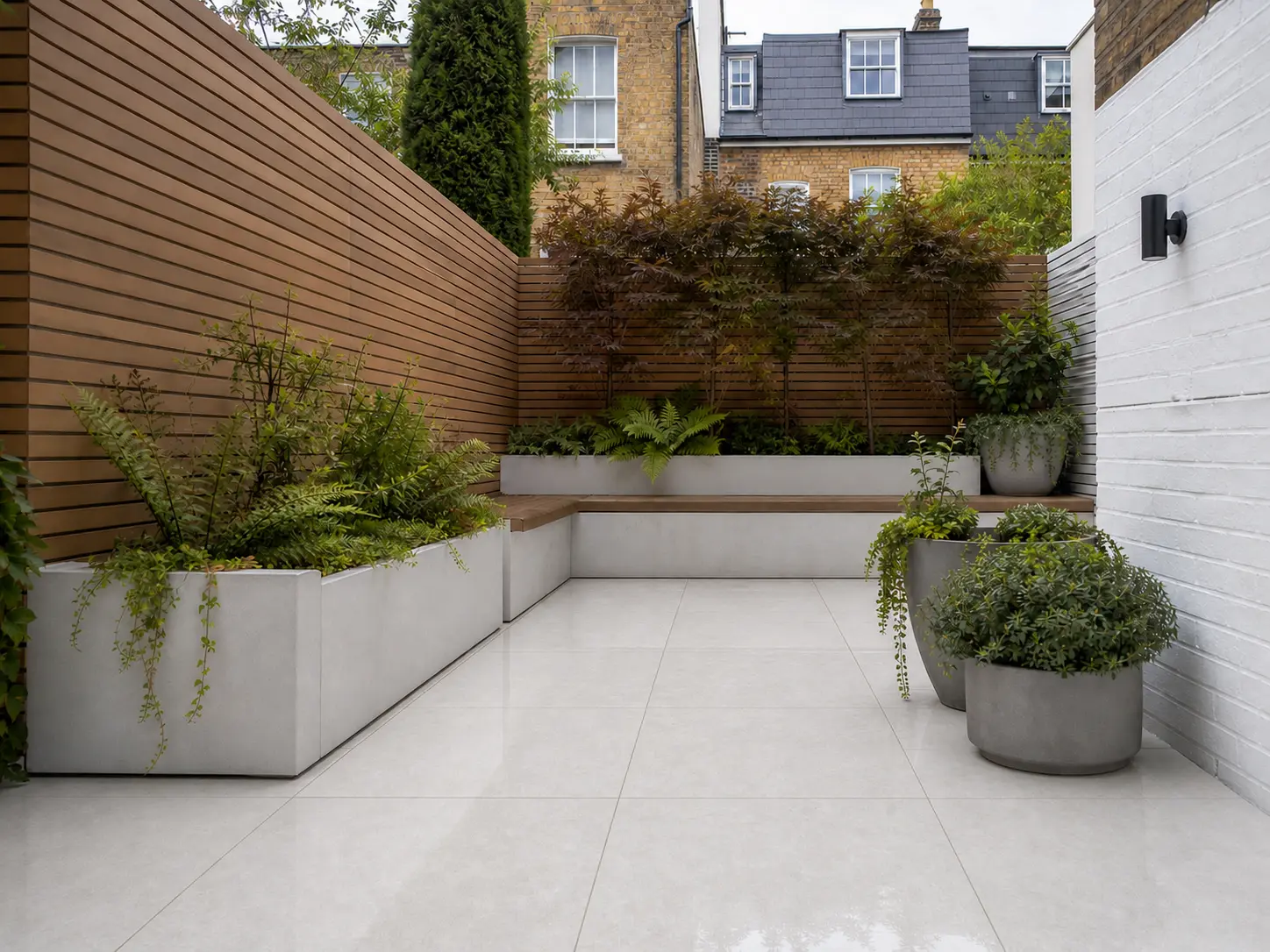 Small UK urban courtyard garden looking bright and spacious with Quartz White Porcelain Paving