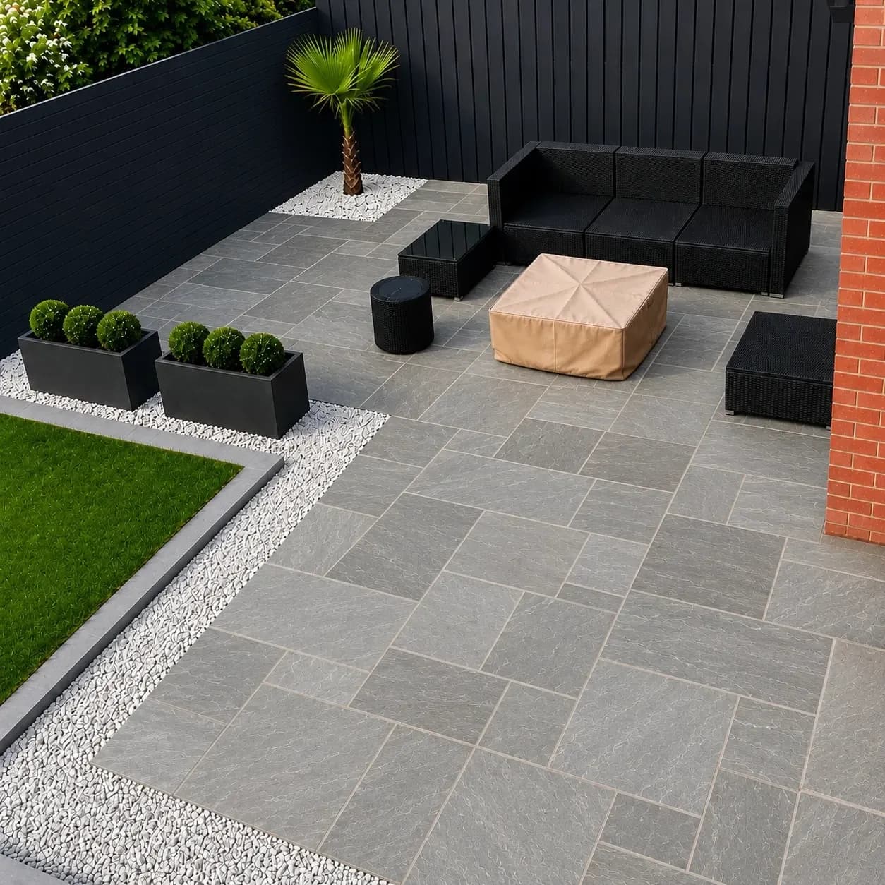 Kandla Grey sandstone patio with black fencing
